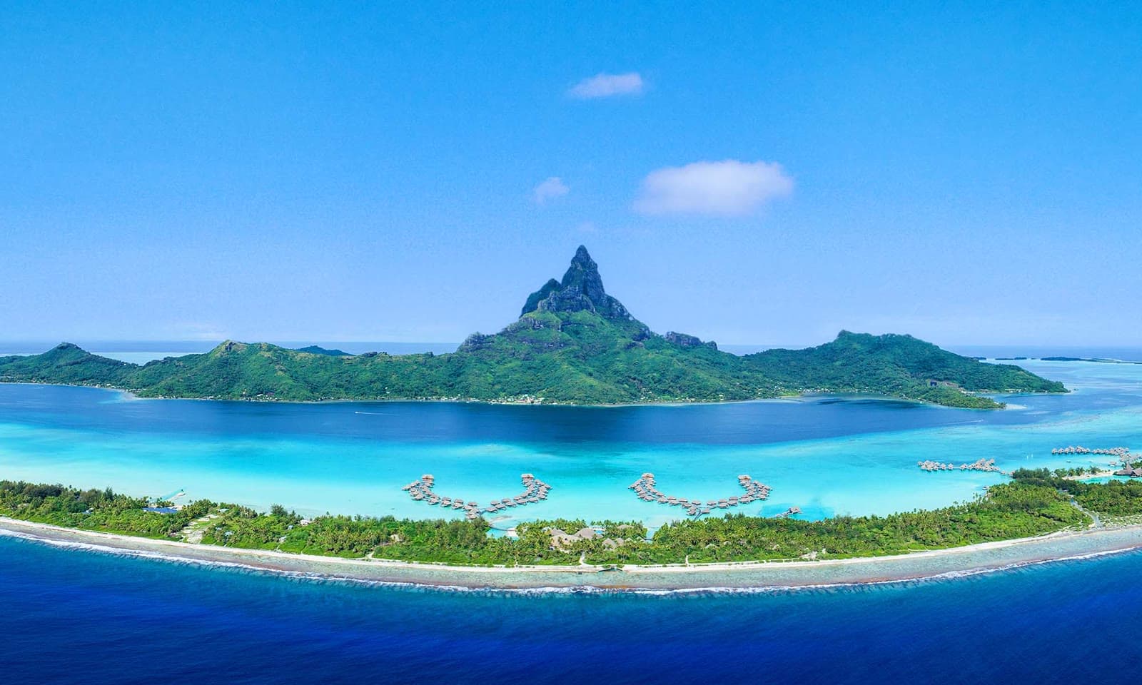 Aerial view of Bora Bora's turquoise lagoon and Mount Otemanu