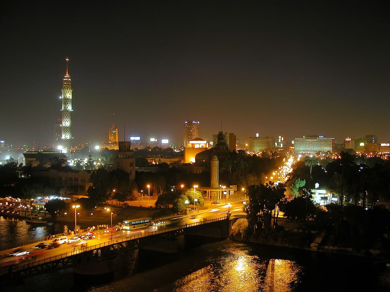 Cairo's skyline along the Nile River lit up at night