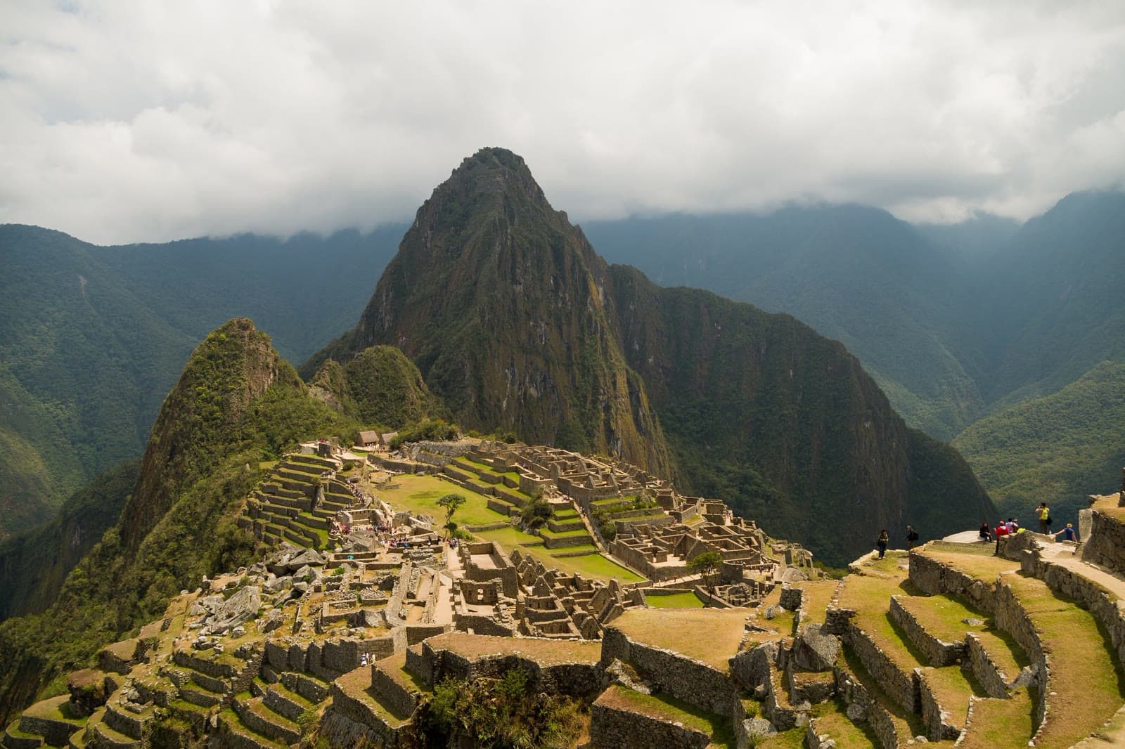 Machu Picchu citadel with Huayna Picchu rising through the clouds