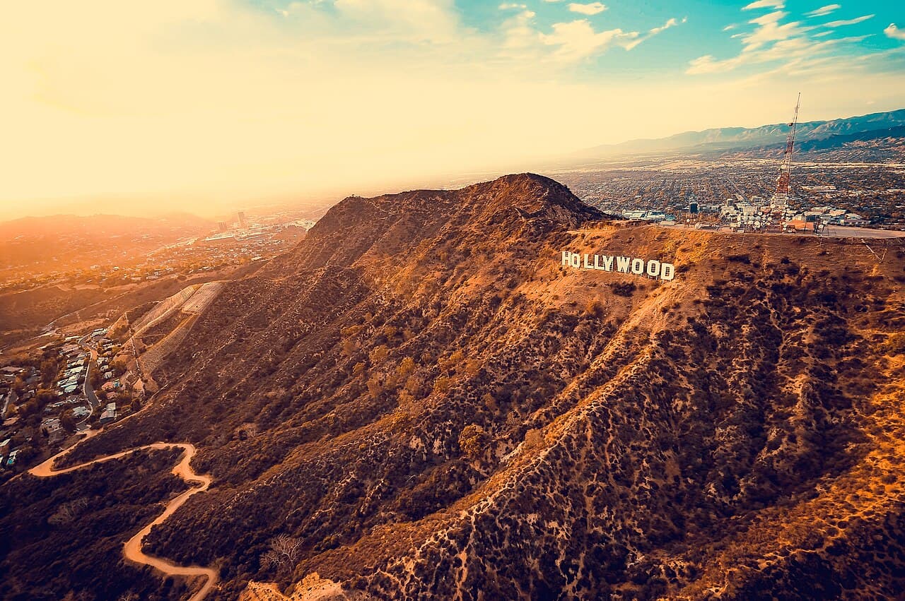 The Hollywood Sign on Mount Lee overlooking Los Angeles at golden hour