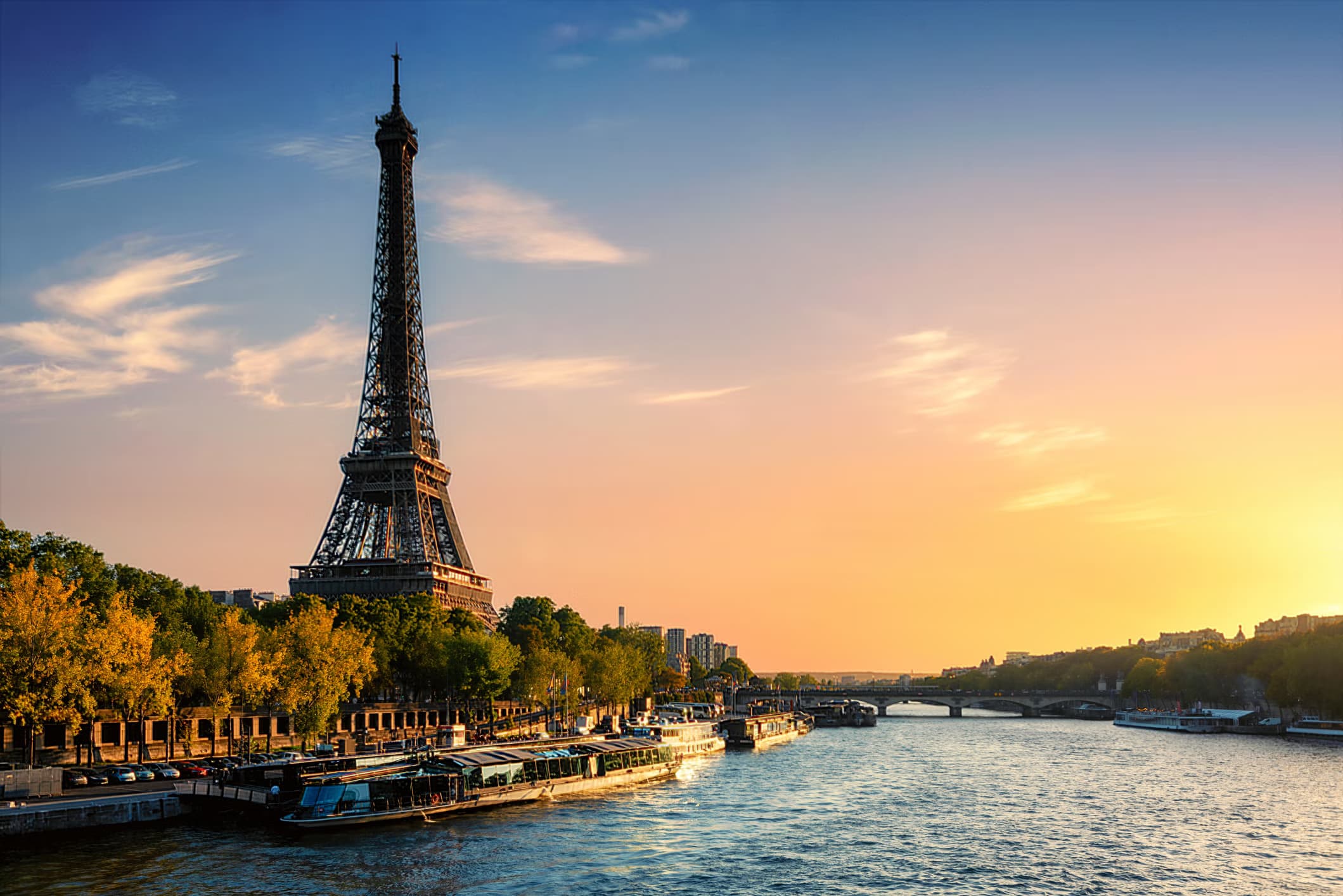 The Eiffel Tower over the Paris skyline at golden hour